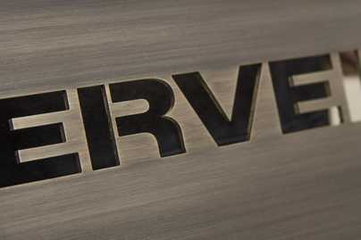 Со сквозной резкой и патинированием фото №1 Латунные таблички - примеры наших работ